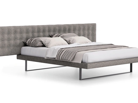 Letto Maya con testiera imbottita di Spagnol Mobili