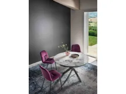 Tavolo rotondo Barone con top in marmo e base in acciaio laccato di Bontempi